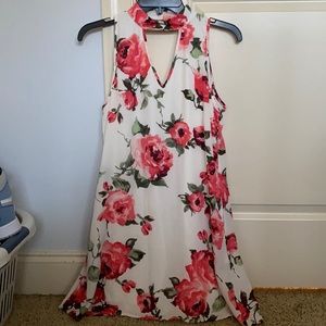 boutique floral dress with cutouts in front & back